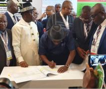 Nigeria-Engr. Simbi Kesiye Wabote signing
